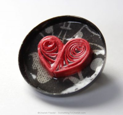 Paper quilled heart pin